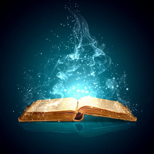 Image of opened magic book with magic lights-1